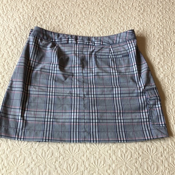 Plaid skort in blue black purple white and red with navy stretch shorts attached - Picture 6 of 13